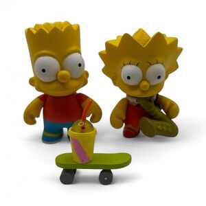 KIDROBOT THE SIMPSONS FIGURES LISA AND BART READ